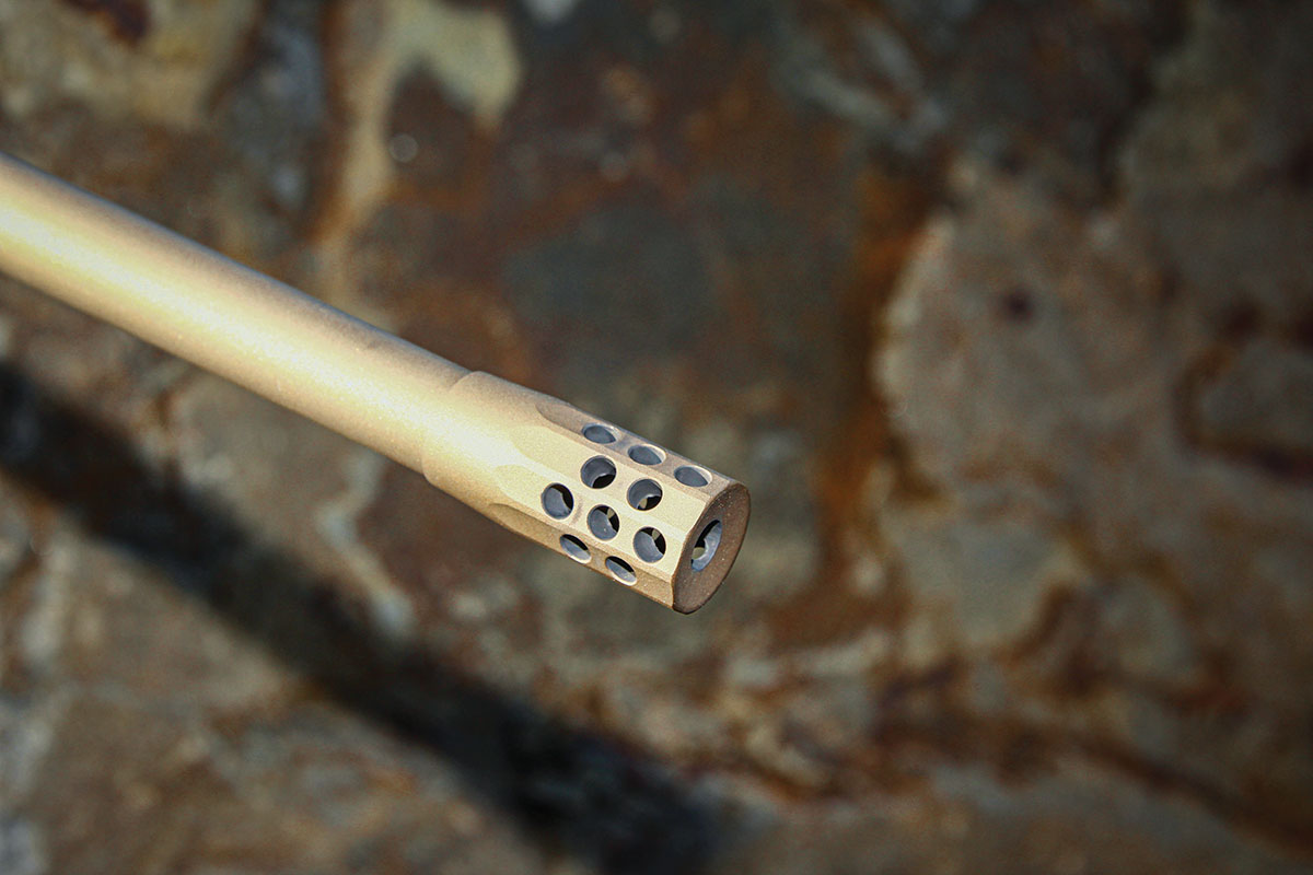 The Montana Rifle Company uses a straight-forward radial muzzle brake on its threaded sporter-weight barrel. The brake was effective at taming recoil and muzzle jump, but proved utterly obnoxious to the ears.